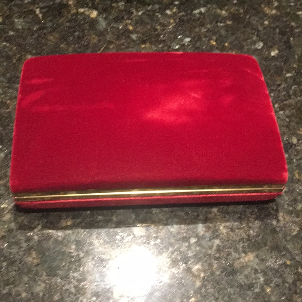 Red jewelry box with gold trim